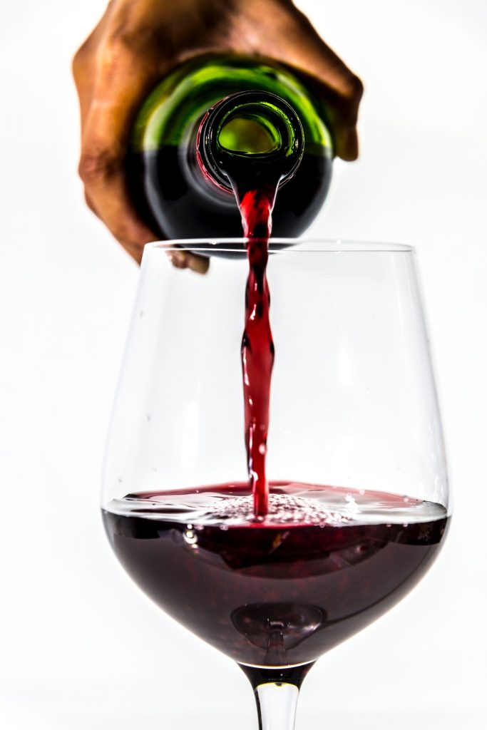 Wine-tasting pouring wine